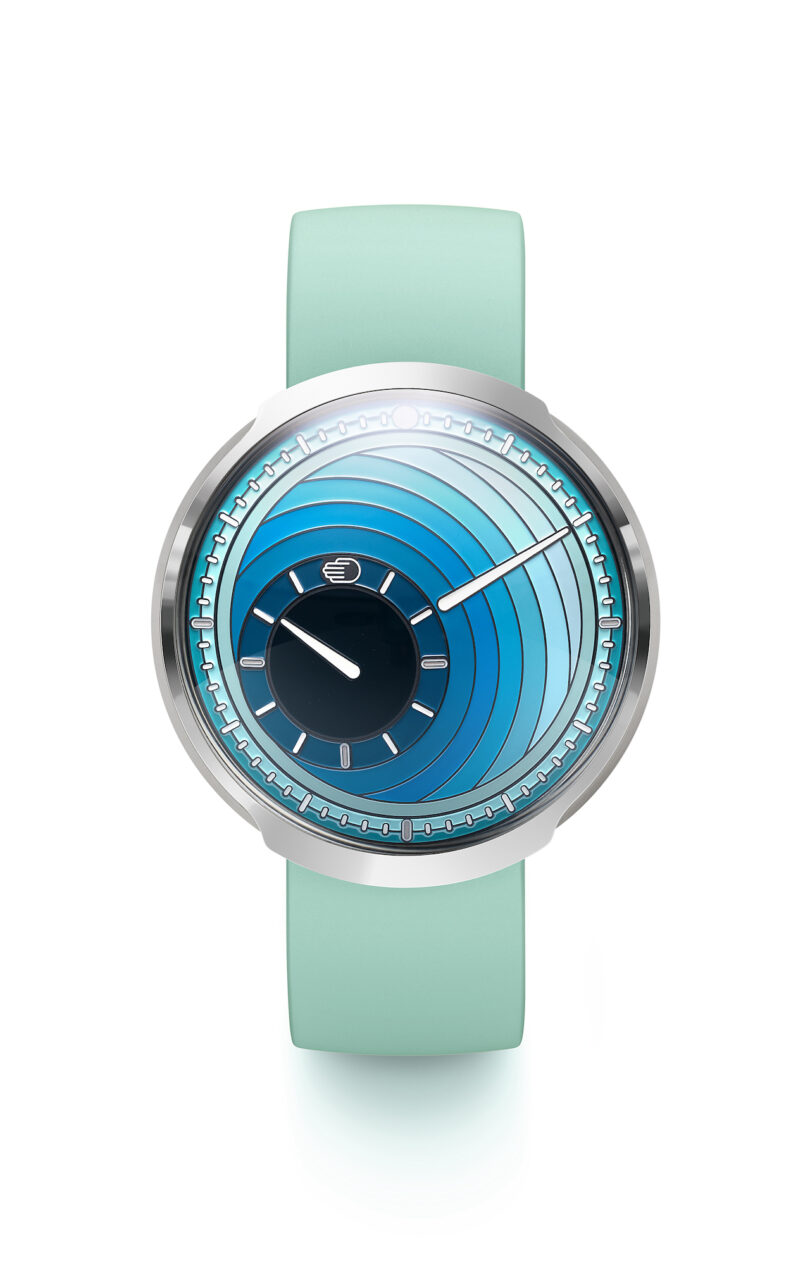 A modern wristwatch with a turquoise strap and a circular blue gradient dial displaying minimalist white hands and markers