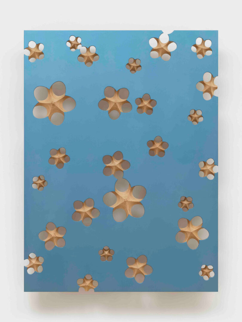 Gloss blue painting on carved plywood support