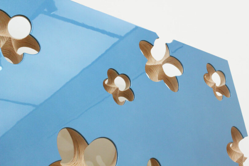 Surface of reflective blue painting