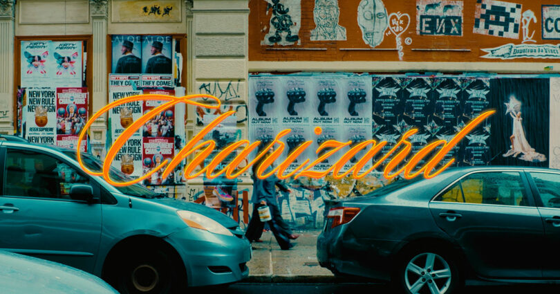 Two cars parked on a city street in front of a wall covered with posters and graffiti, with the word "Charizard" in large orange script across the image.