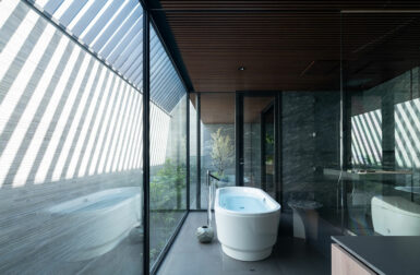 Stealth Is a Resort-Style Home Hidden Behind a Monolithic Facade in Tokyo