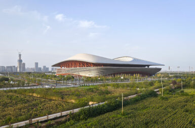 A Football Stadium With Fluid Forms Rises Above in China